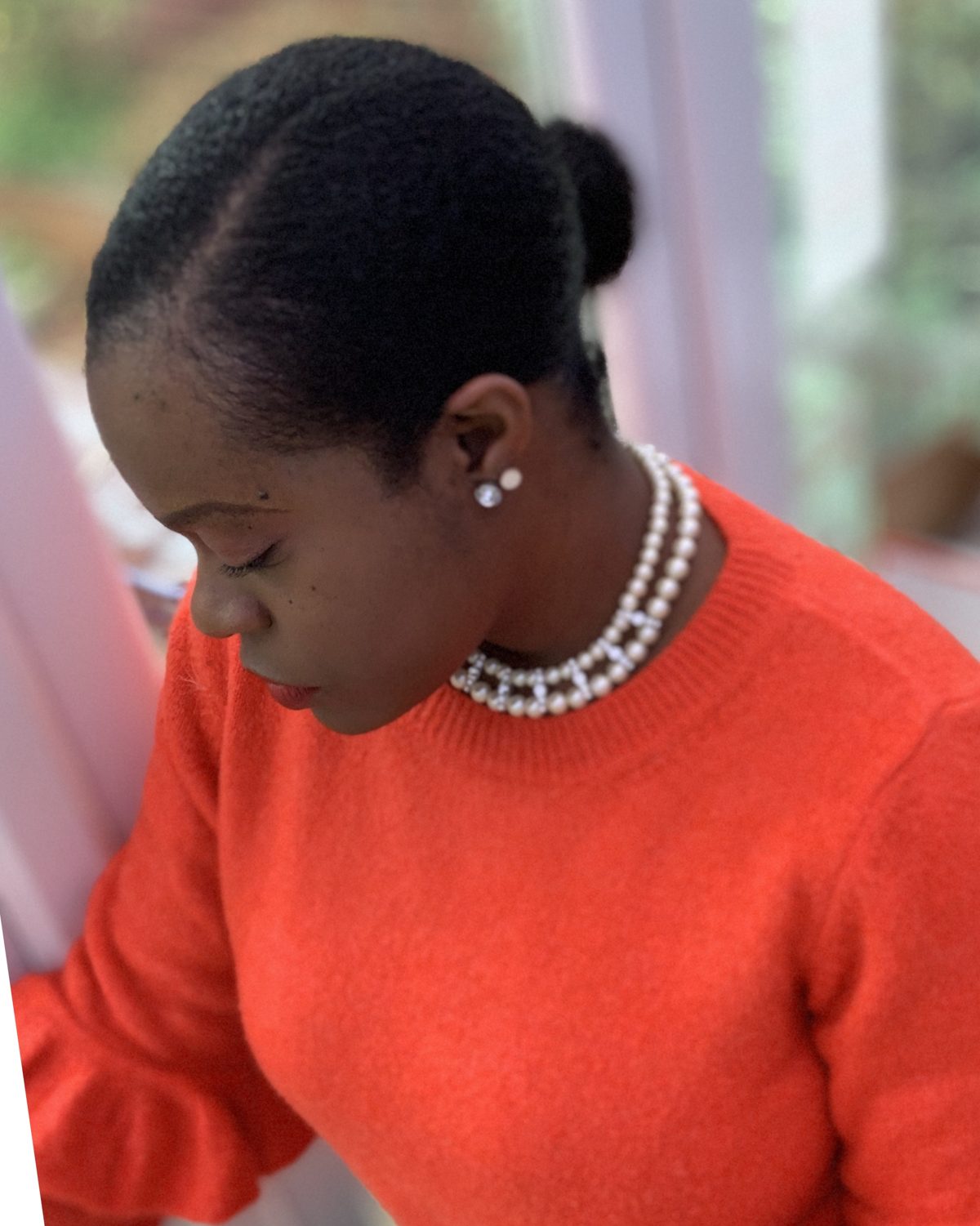 Joycellyn Akuffo looking down, deep in thought